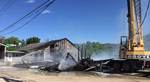 Former Lansing Feed Service catches fire Monday afternoon ...