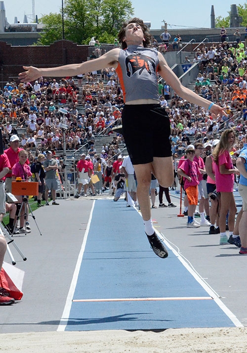 One final flight ... Waukon boys track senior Isaiah Welch elevates himself in the Class 2A long jump competition at the State Track Meet in Des Moines Thursday, May 17, finishing 14th among the Class 2A field in the event with a leap of 19’8.5”. He also joined fellow senior Abe Schwartz and the sophomore pair of Brock Hatlan and Dawson Baures in the 4x200 relay at the season grand finale, running to a 20th-place overall finish in the 24-team Class 2A field of the event with a clocking of 1:35.07. View and 