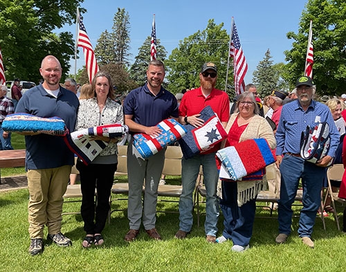 Waukon Patriot Quilters honored local veterans with Veterans Quilts during the Memorial Day Observance Program in Waukon Monday, May 29. Pictured above, left to right, are James Downing, Joanna Downing, Kevin Reinhardt, Jay Christianson, Maxine... <a href="/articles/2023/06/07/local-veterans-honored-waukon-patriot-quilters">+ continue reading</a> 
